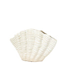 An off-white, shell-shaped vase with a textured, wavy surface, seen from an angle.