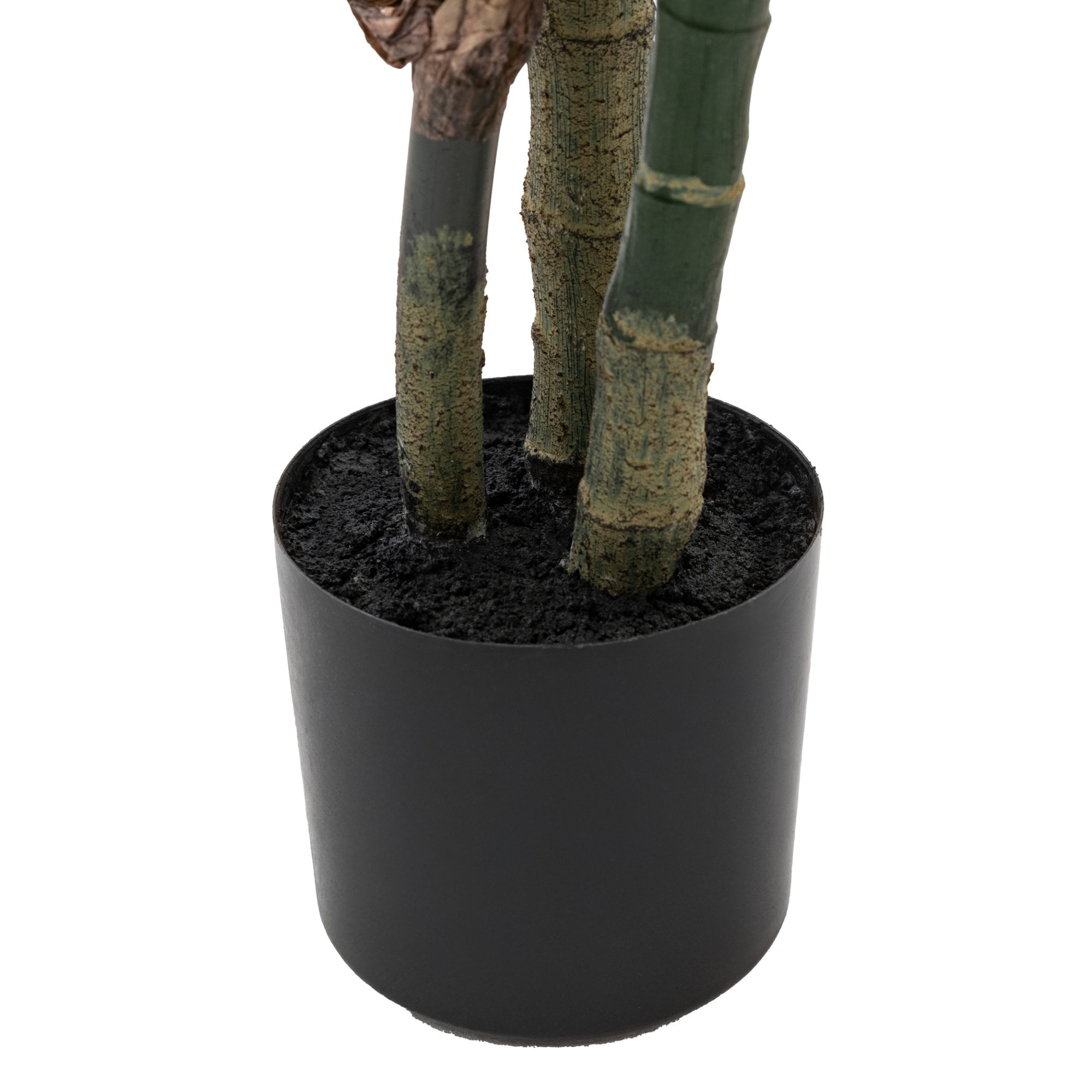 Base of a faux plant with visible stems in a simple black plastic pot.
