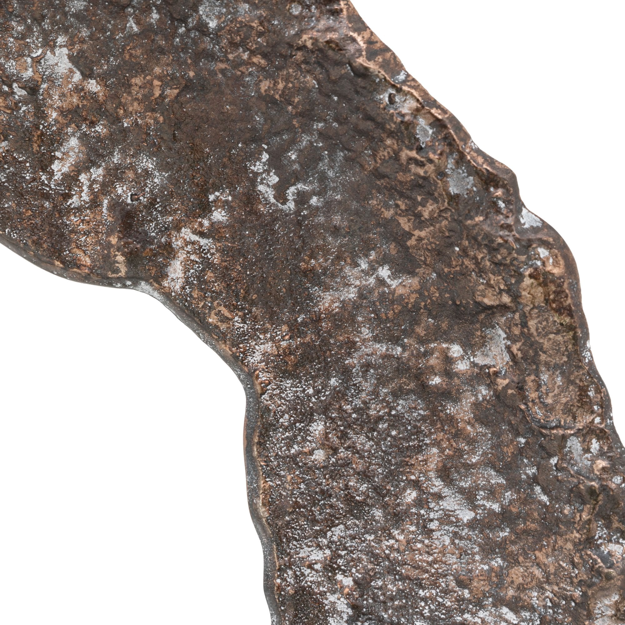 Close-up of the textured surface of the rustic, bronze-colored metal ring sculpture.