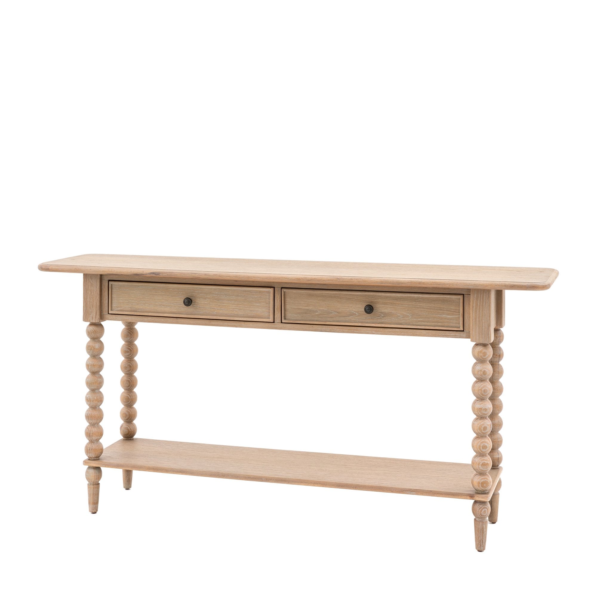 Angled view of a light wood console table with two drawers and bobbin legs.