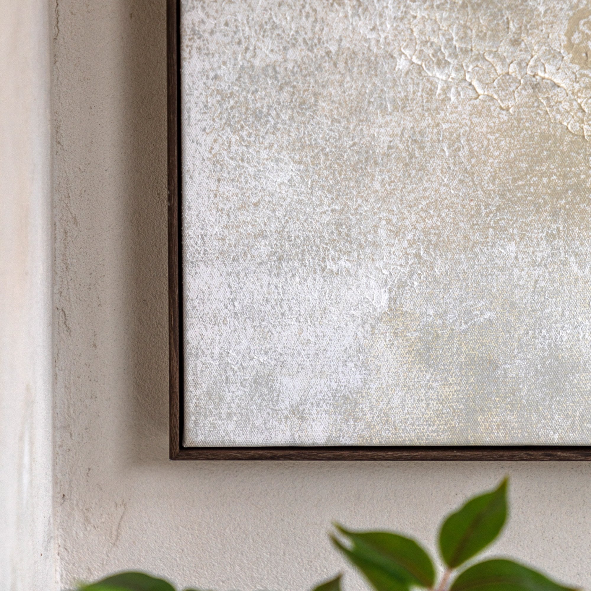 Close-up of the textured surface of an abstract painting.