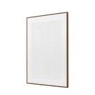 A framed piece of white and textured wall decor, angled to the left.