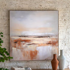 Abstract painting on a white brick wall, two white vases in the foreground.