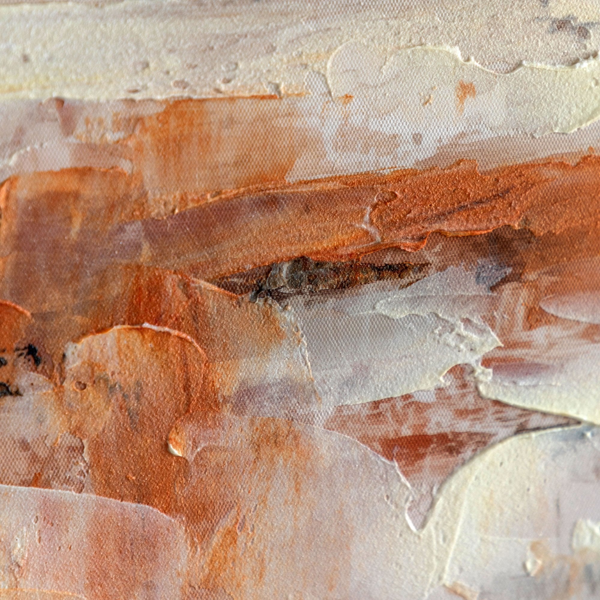 Close-up of the textured, abstract brushstrokes in an artwork.
