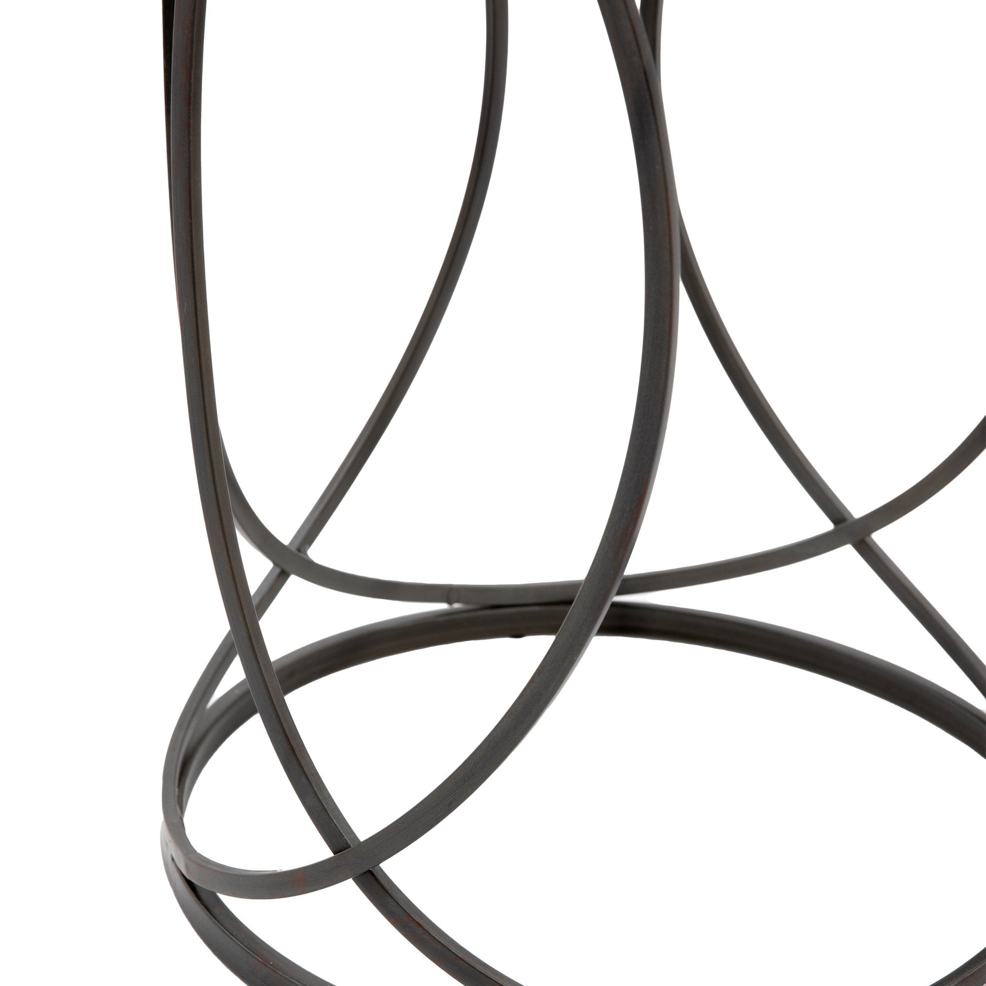 Close-up of the black metal geometric base of a round side table on a white background.