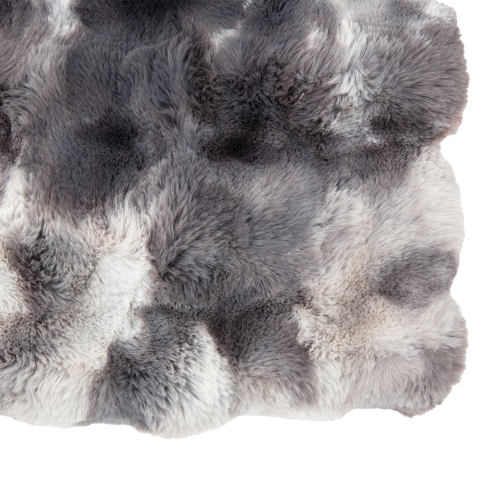 A detailed corner of the faux fur throw, showing the blend of gray and white.