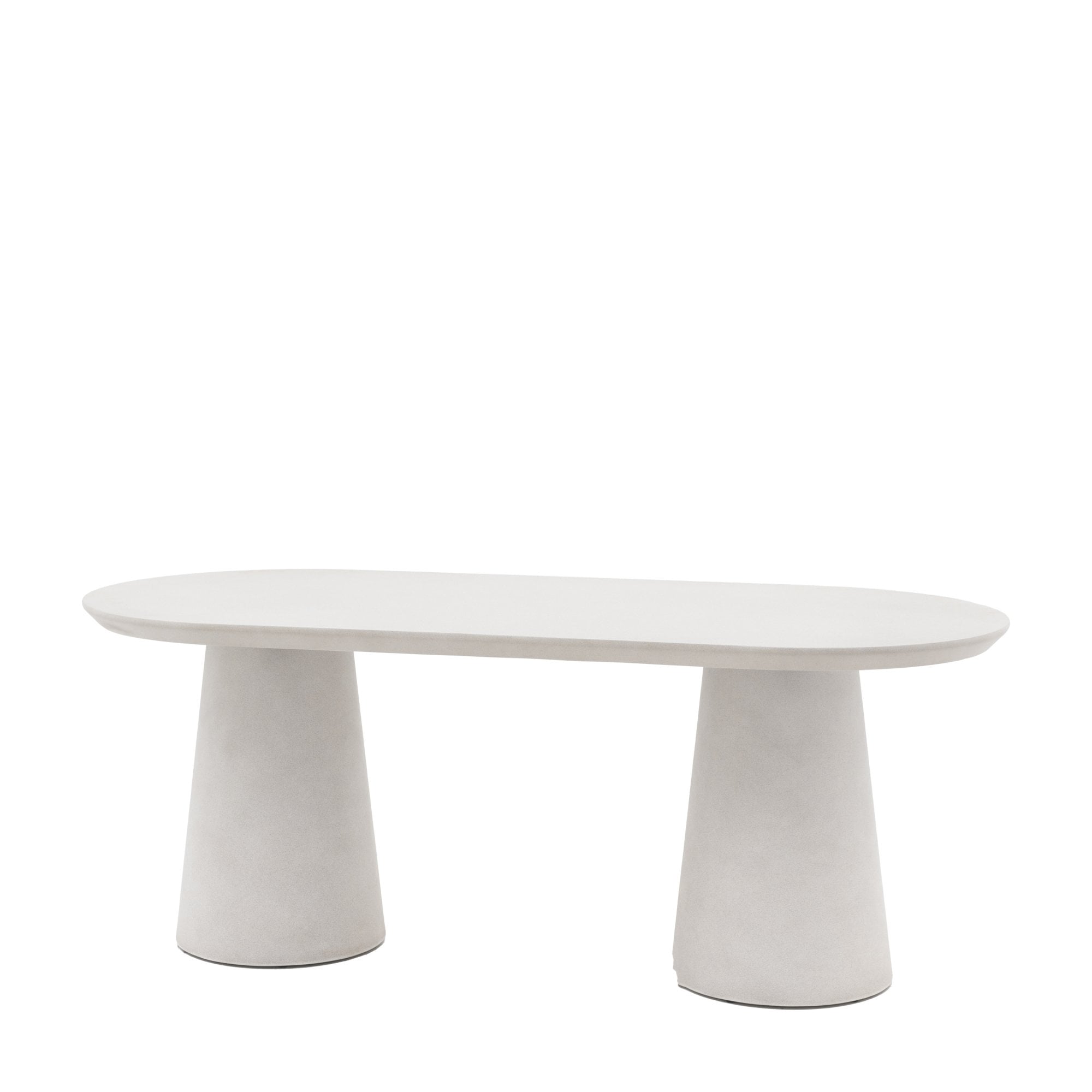 A minimalist oval table with two solid pedestal bases, captured from a slightly angled perspective.