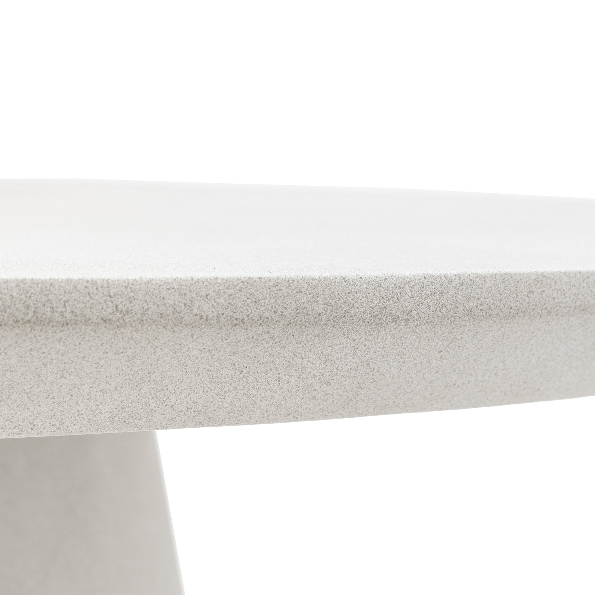 Close-up of the tabletop edge, showing its texture and thickness.