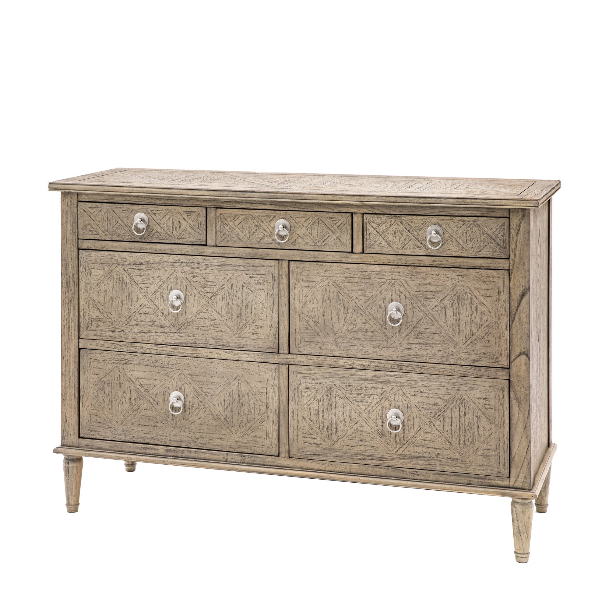 Angled view of a seven-drawer dresser with a textured wood finish.