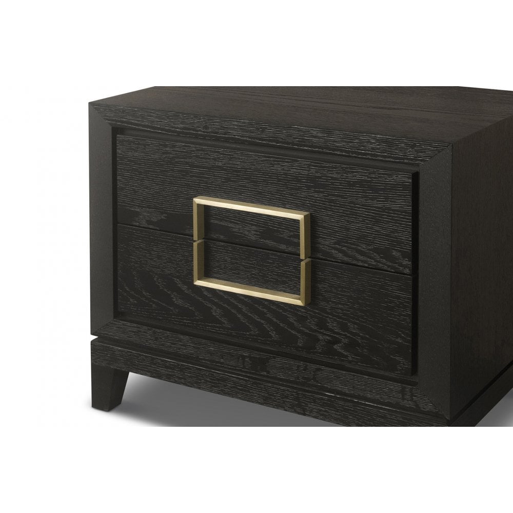 A close up of the top drawer of the bedside table, with the gold accent.