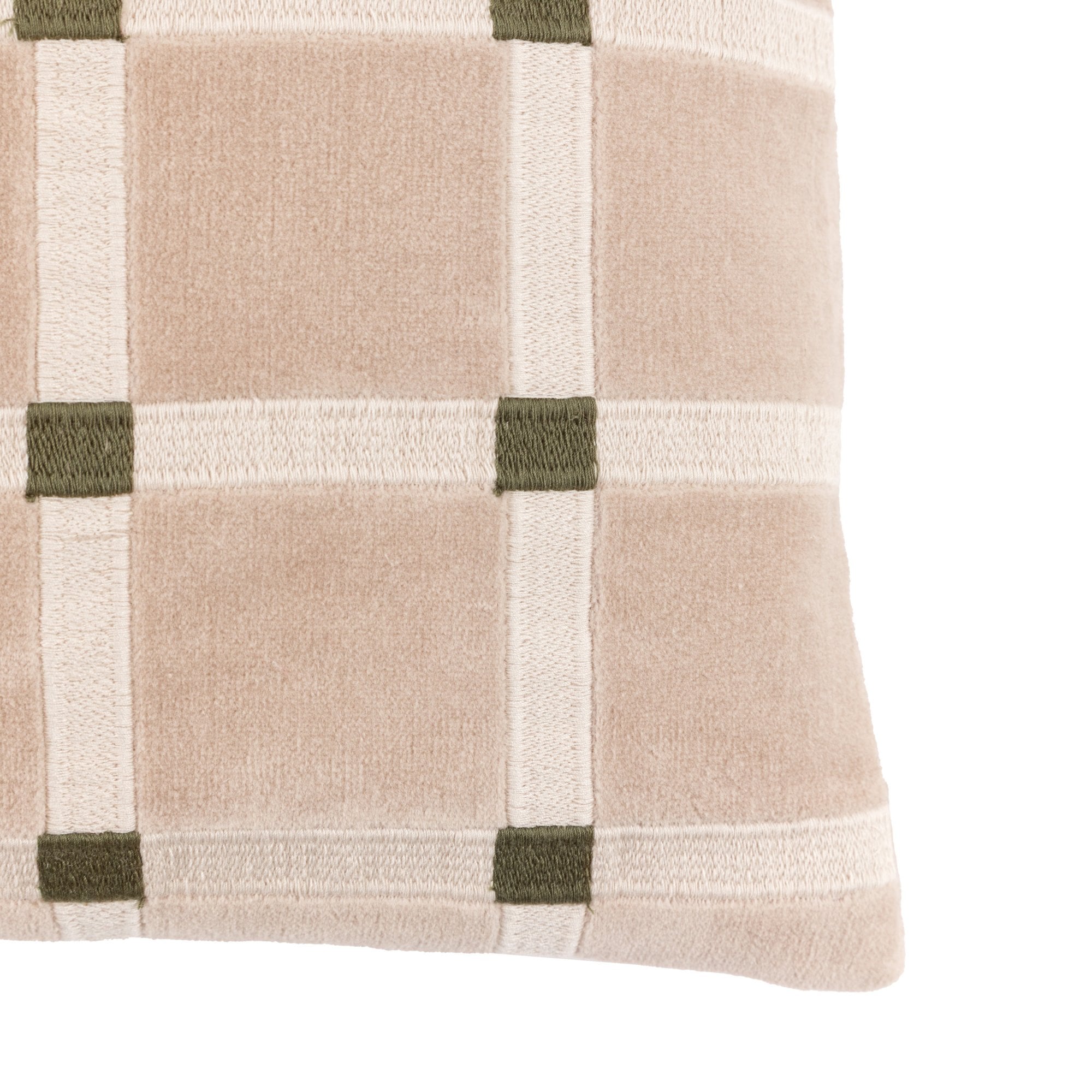 A detailed corner shot of the beige and white plaid throw pillow with green squares.