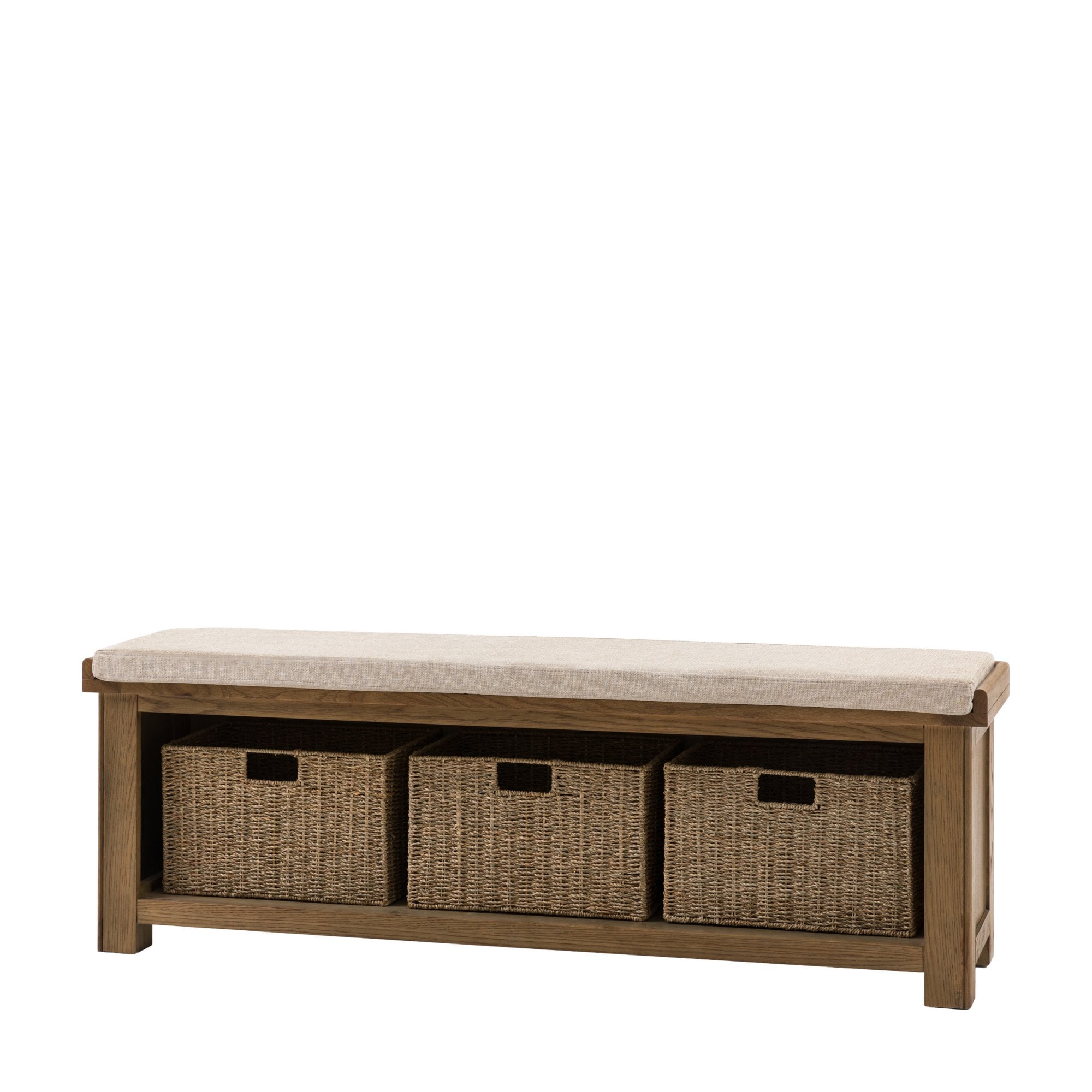An angled front view of the wooden storage bench with three wicker baskets and a cushion.