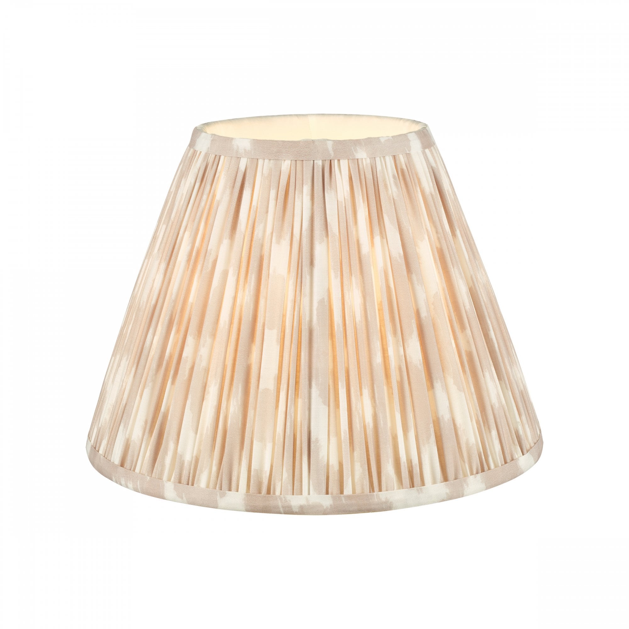 A pleated lamp shade in an off-white and pale brown vertical stripe pattern.