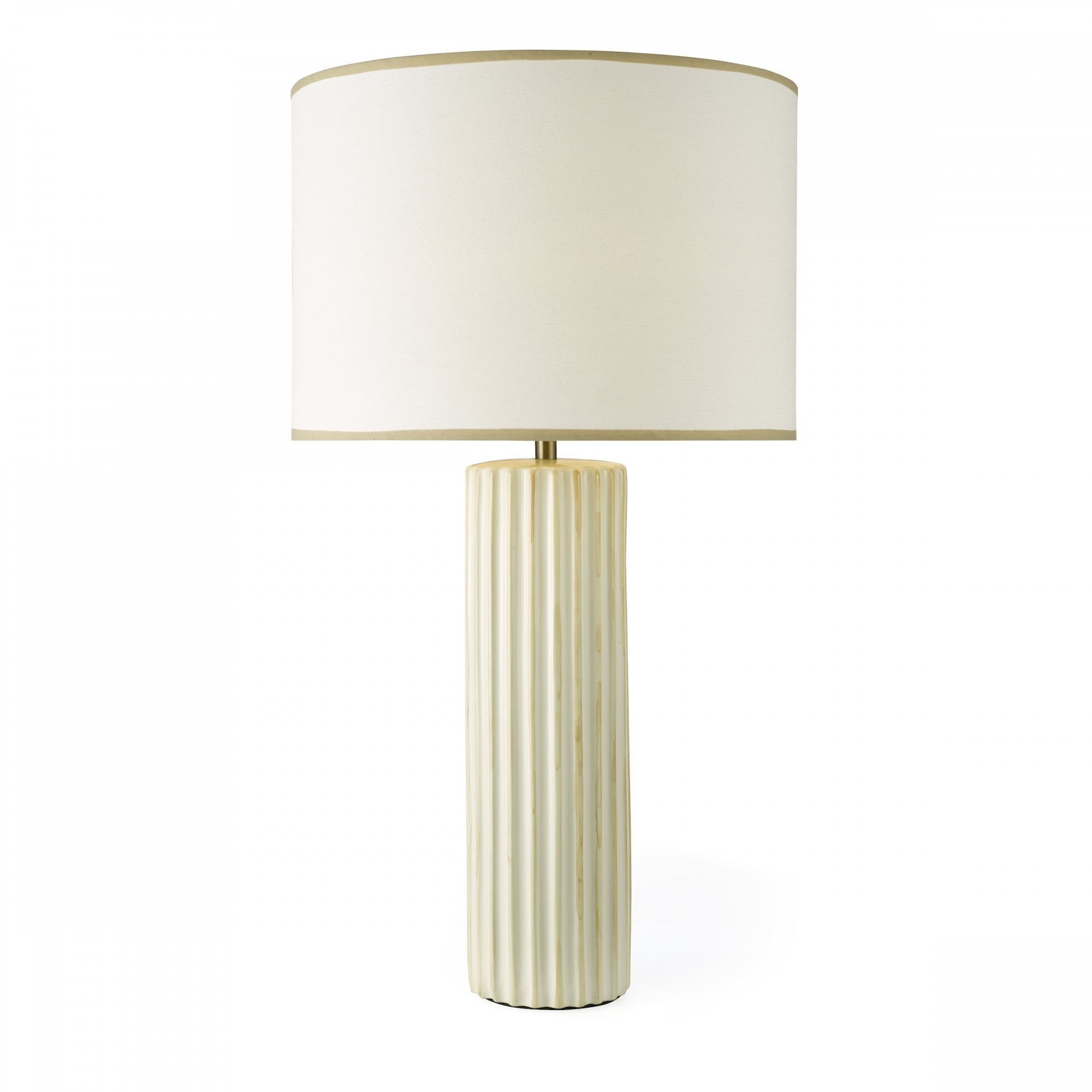 A white fluted table lamp with a cream shade, against a white background.
