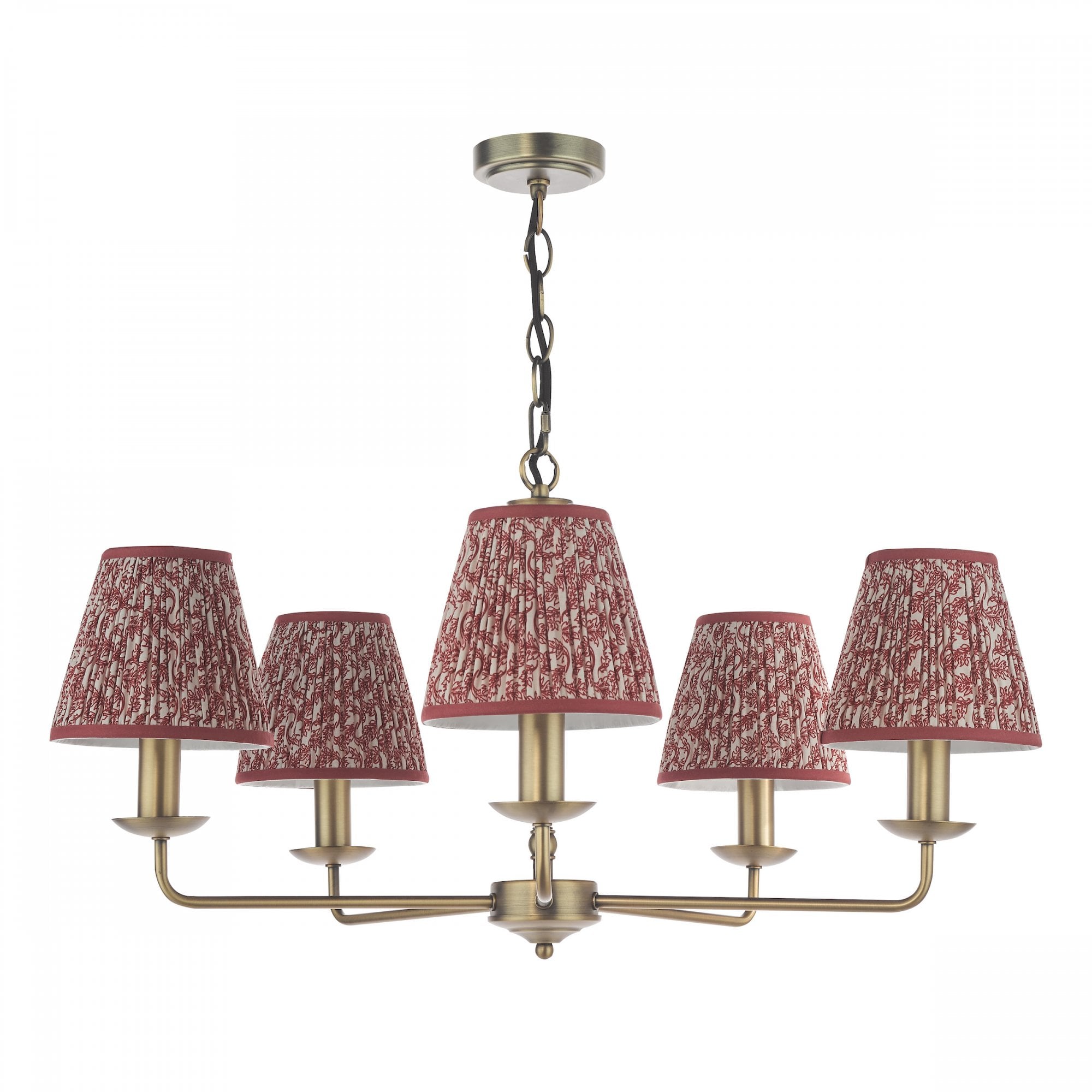 A brass five-arm chandelier with red patterned fabric shades against a white background.