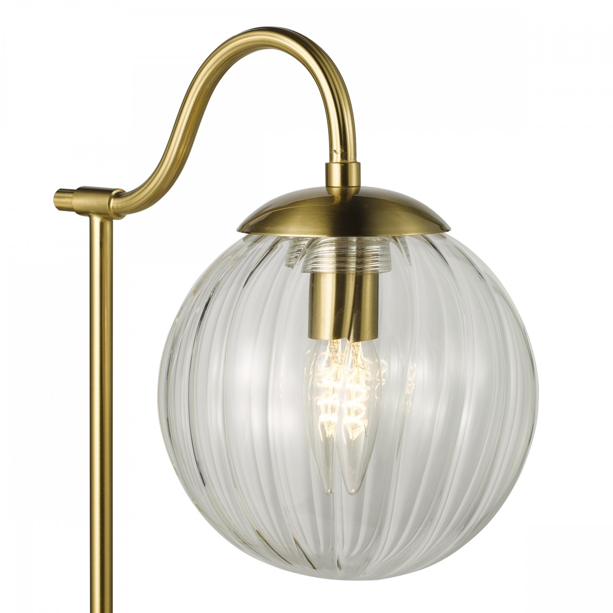 Close-up of the lamp's clear ribbed glass shade and brass fitting.