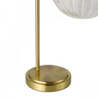Close-up of the lamp's sturdy brass base.