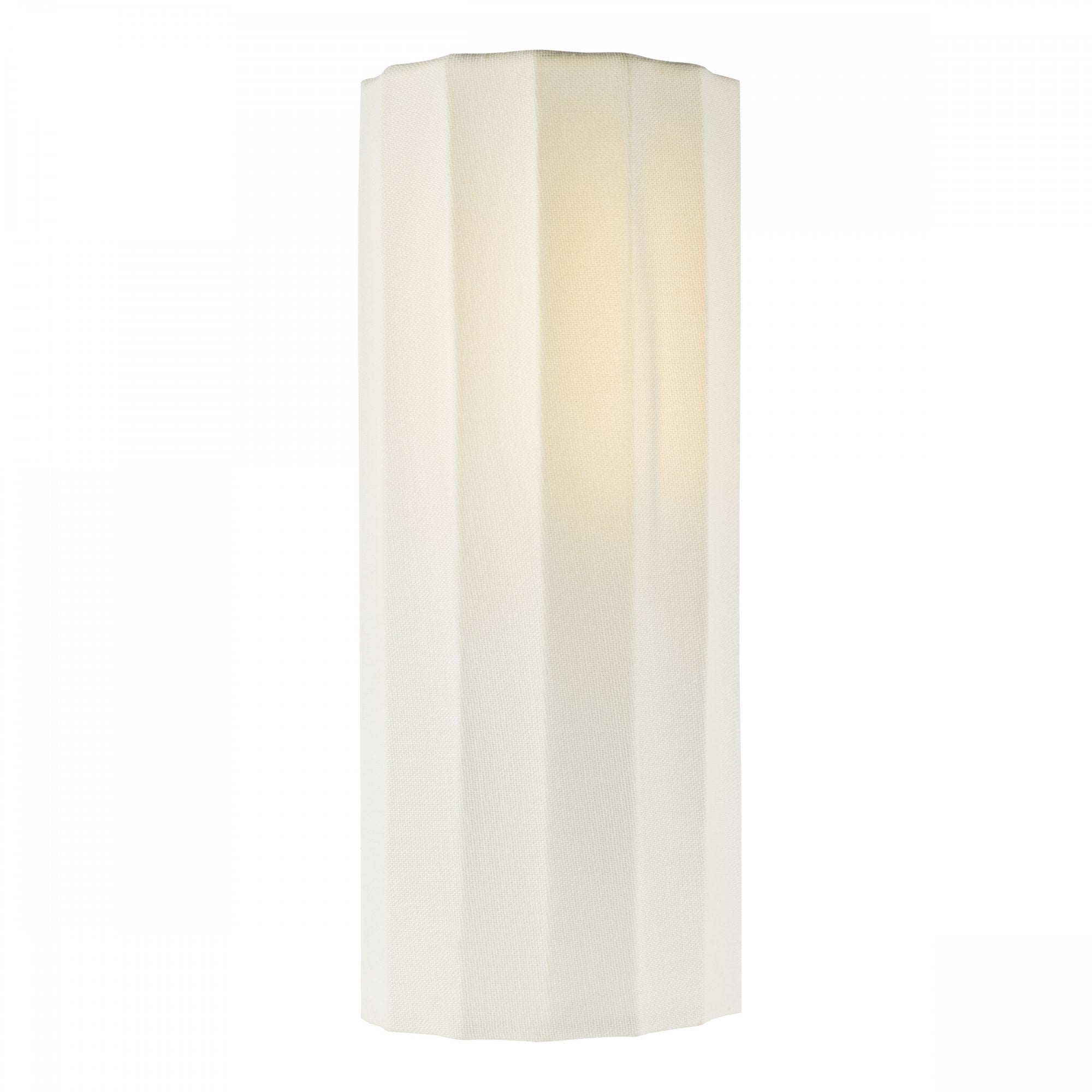 A white fluted wall light casts a warm glow, showcasing its textured design.
