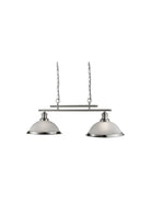 A metal pendant light with two frosted dome shades hangs from chains.