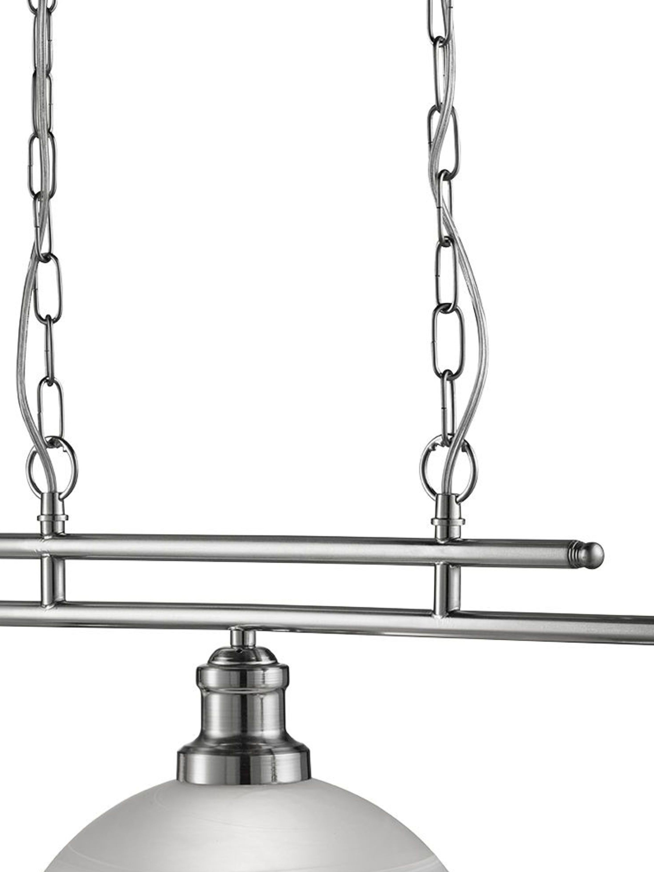 Close-up of the white and silver three-light billiard pendant light fixture hanging.