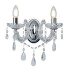 A close-up of a two-bulb wall sconce with crystal accents.