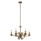 A brass chandelier with five lights hanging from a chain.