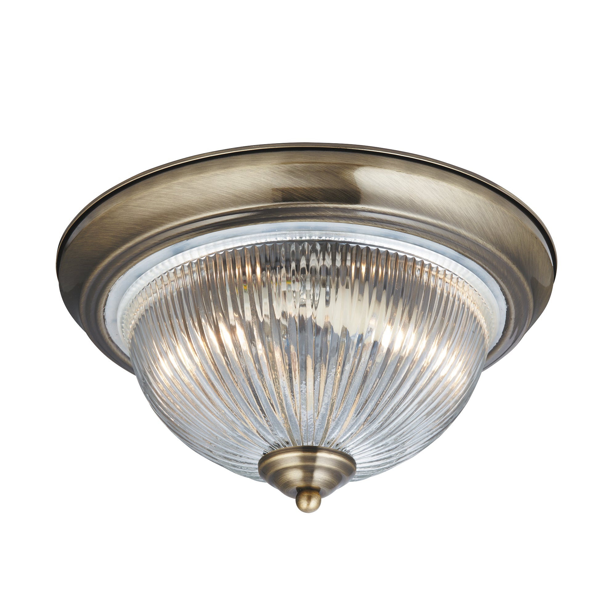 An antique brass ceiling light with a ribbed glass shade and decorative finial.
