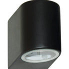 A black cylindrical wall light with a downward-facing bulb.