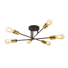 A modern black and gold sputnik-style ceiling light with six exposed bulbs.