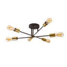 A stylish ceiling light featuring a black base with six gold-accented arms holding exposed bulbs.