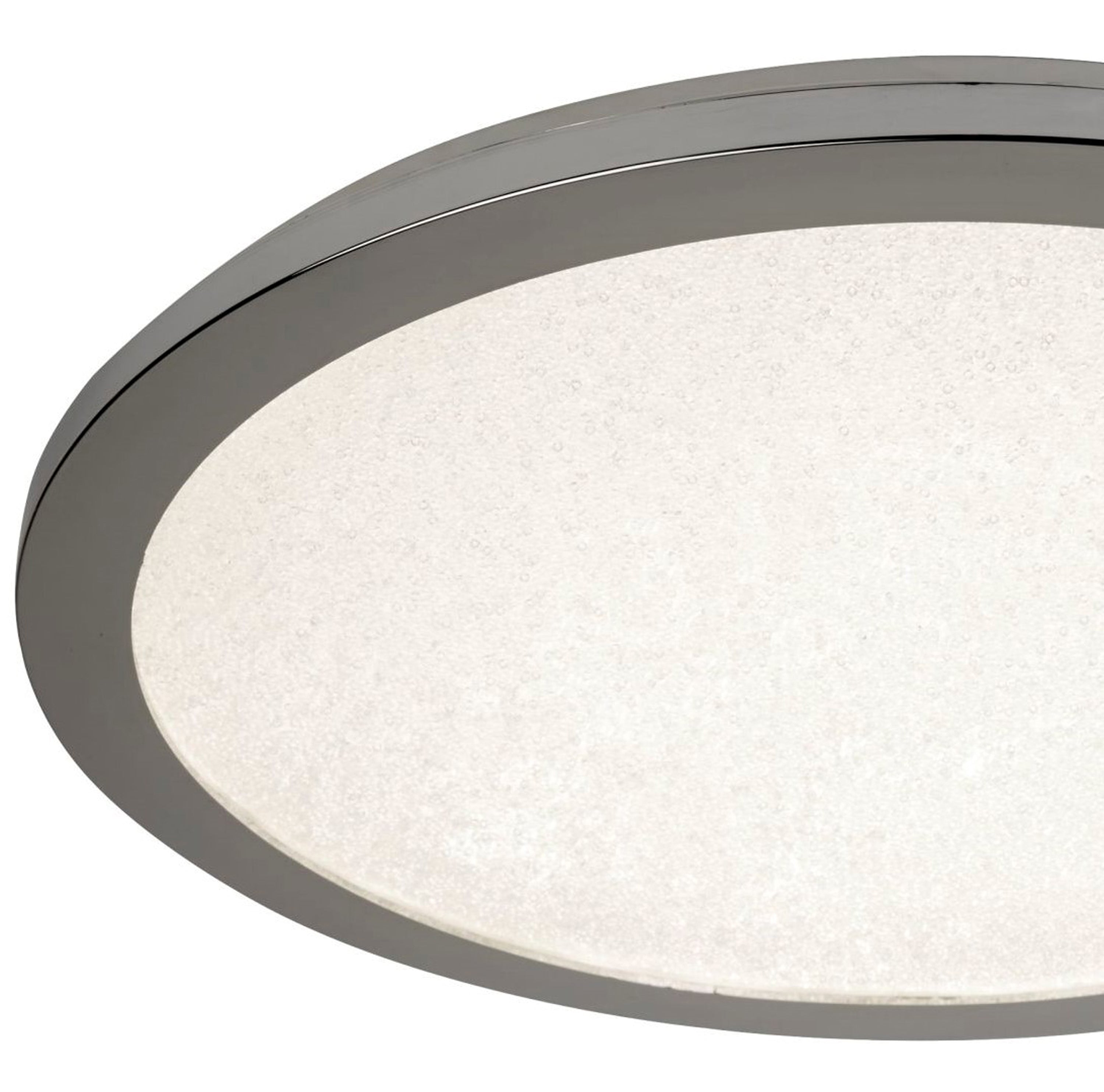 Close-up of a round ceiling light with a silver rim and textured white diffuser.