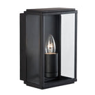 Black outdoor wall light with clear glass and a single bulb.