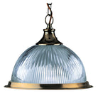 A ribbed glass dome pendant light with an antique brass fixture and chain.