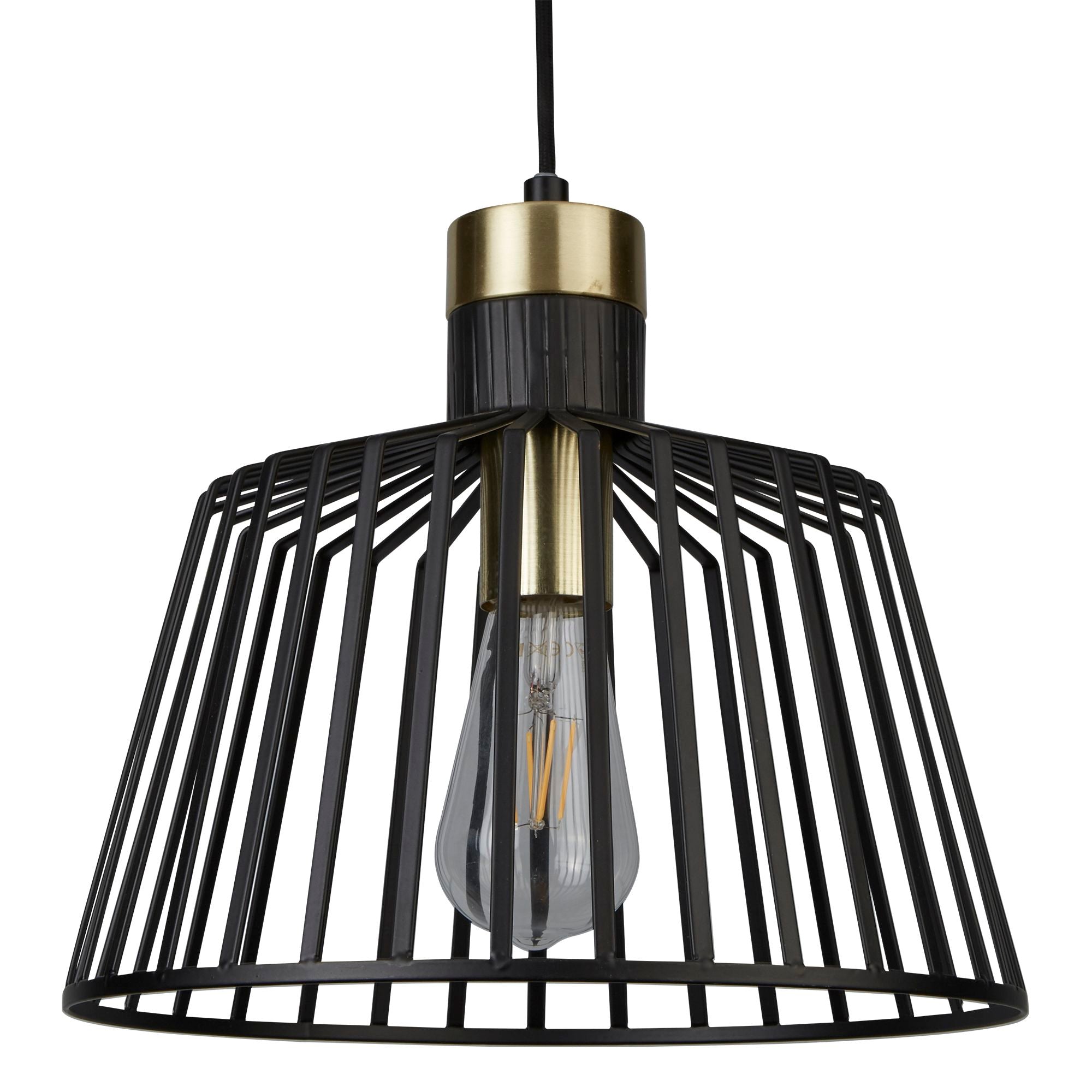 A black wire-cage pendant light with a brass accent and clear bulb.
