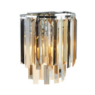 Crystal wall light with warm illumination.