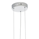 Close-up of the chrome ceiling rose and suspension wires of a pendant light.