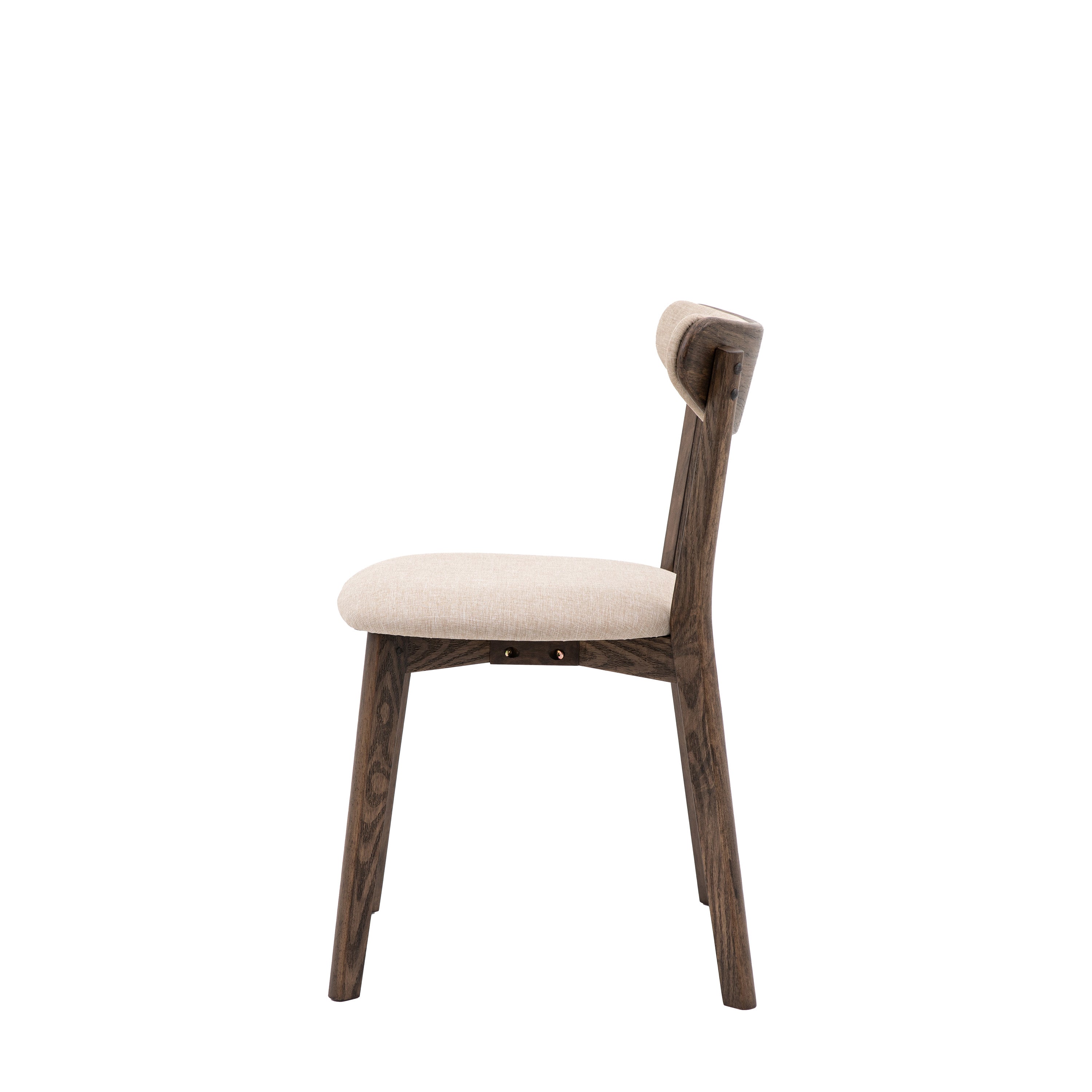 A side profile of a modern dining chair, featuring its curved back and sturdy wooden legs.