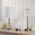 Three rechargeable table lamps.