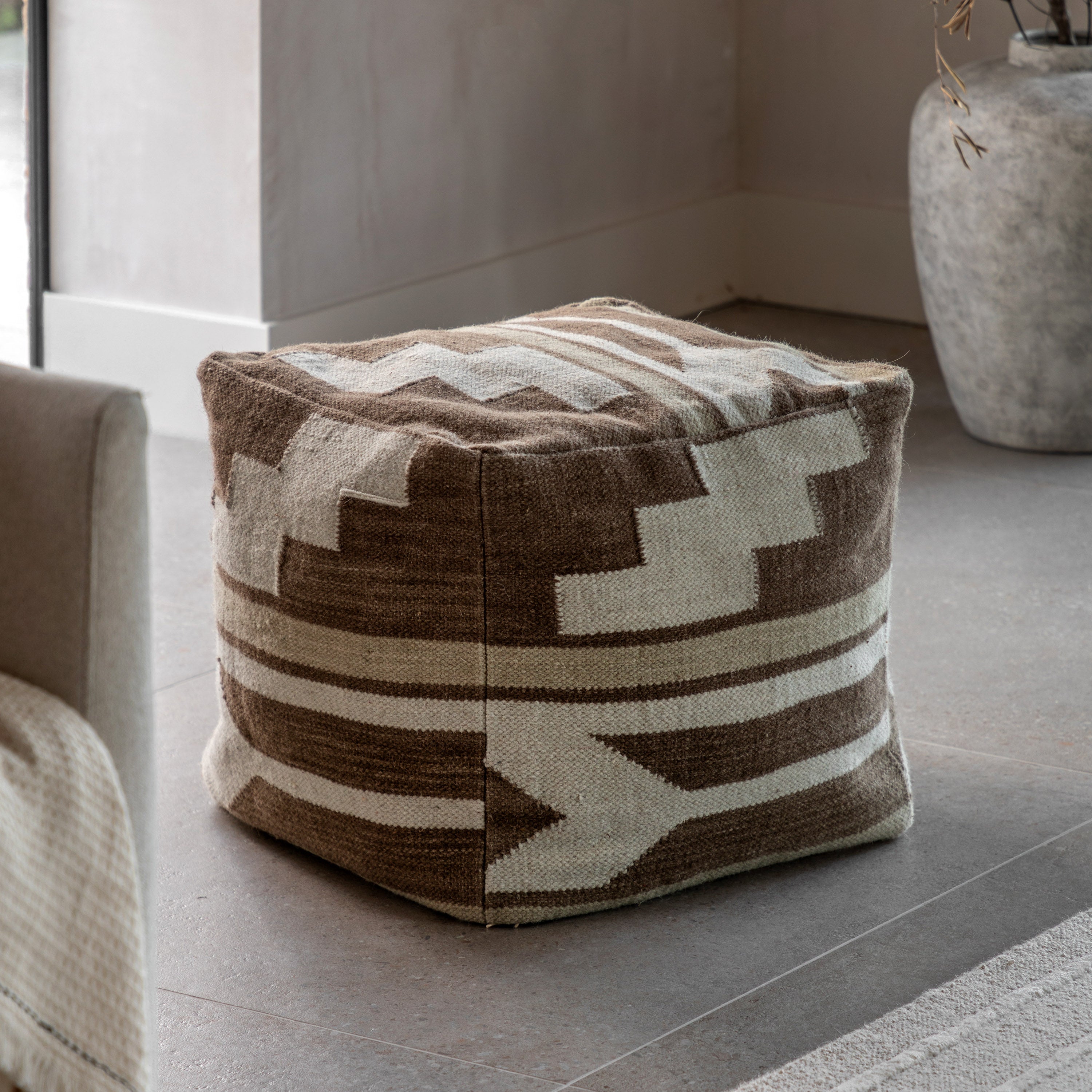 Boho pouf in a living room.