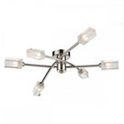 A modern chrome ceiling light with six frosted glass shades arranged radially.