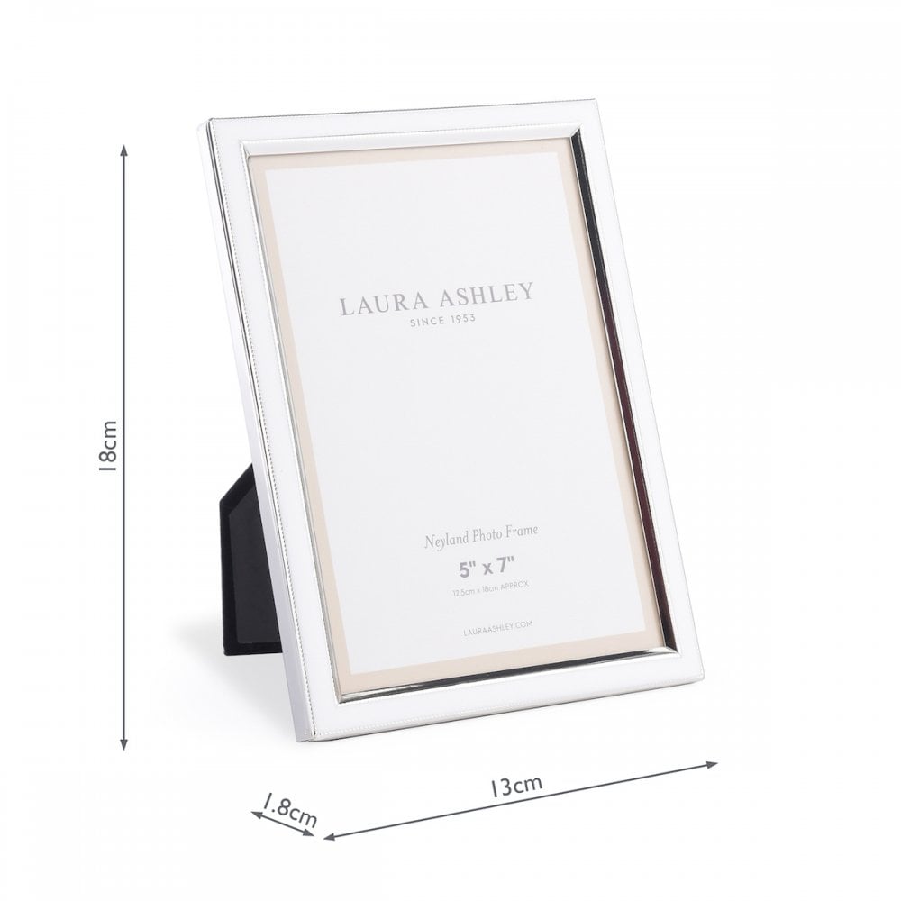 A shiny silver Laura Ashley Neyland 5" x 7" photo frame with dimensions shown.
