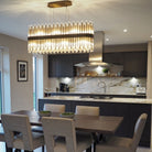 Colmar Antique Brass Long Chandelier with Glass Tubes by RV Astley